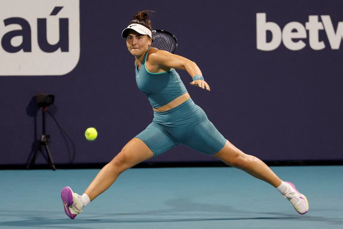 Bianca Andreescu reaches for a forehand against Ekaterina Alexandrova.