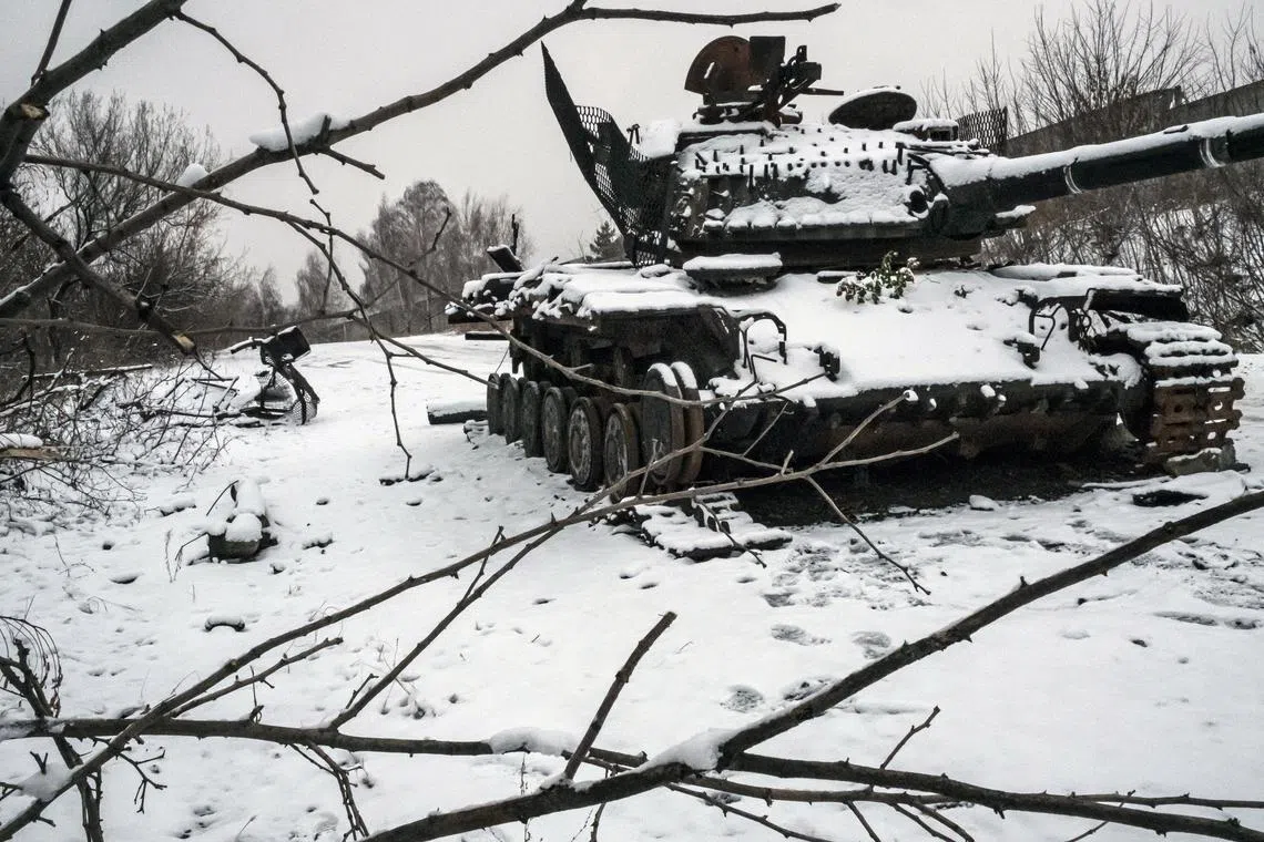 A destroyed Ukrainian tank seen in Kharkiv on Dec 7. The widespread assumption that Russia could not sustain this punishing pace of operations has proved misplaced.