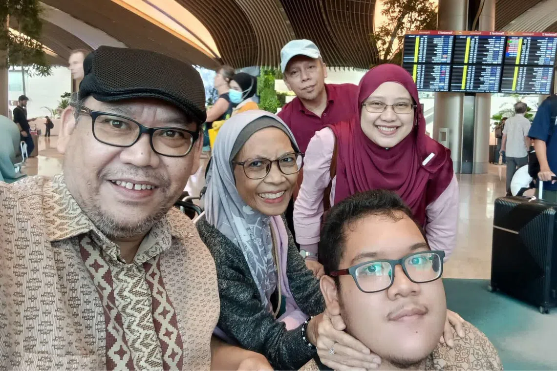 family photo with parents and relatives