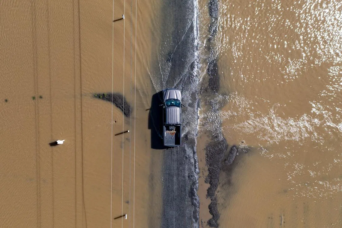 A flooded road from a breached levee on the Pajaro River in Monterey County after storms hit Northern California, on March 15.