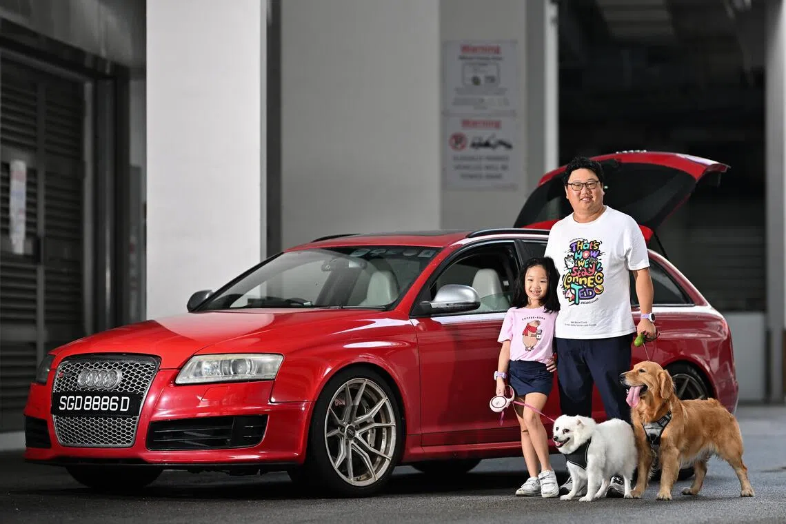 ST20251002-202588400295-Lim Yaohui-Lee Nian Tjoe-epmycar10/

Mr Brian Tan, 43, co-founder of a kids tech startup, with his daughter Jacqueline Tan, 7, primary one pupil; Anna, a four-year-old female golden retriever; and Elsa, a nine-year-old female Japanese Spitz; next to his Audi RS6 Avant at Premier @ Kaki Bukit on Oct 2, 2025. 

For Me and My Car interview.

(ST PHOTO: LIM YAOHUI)