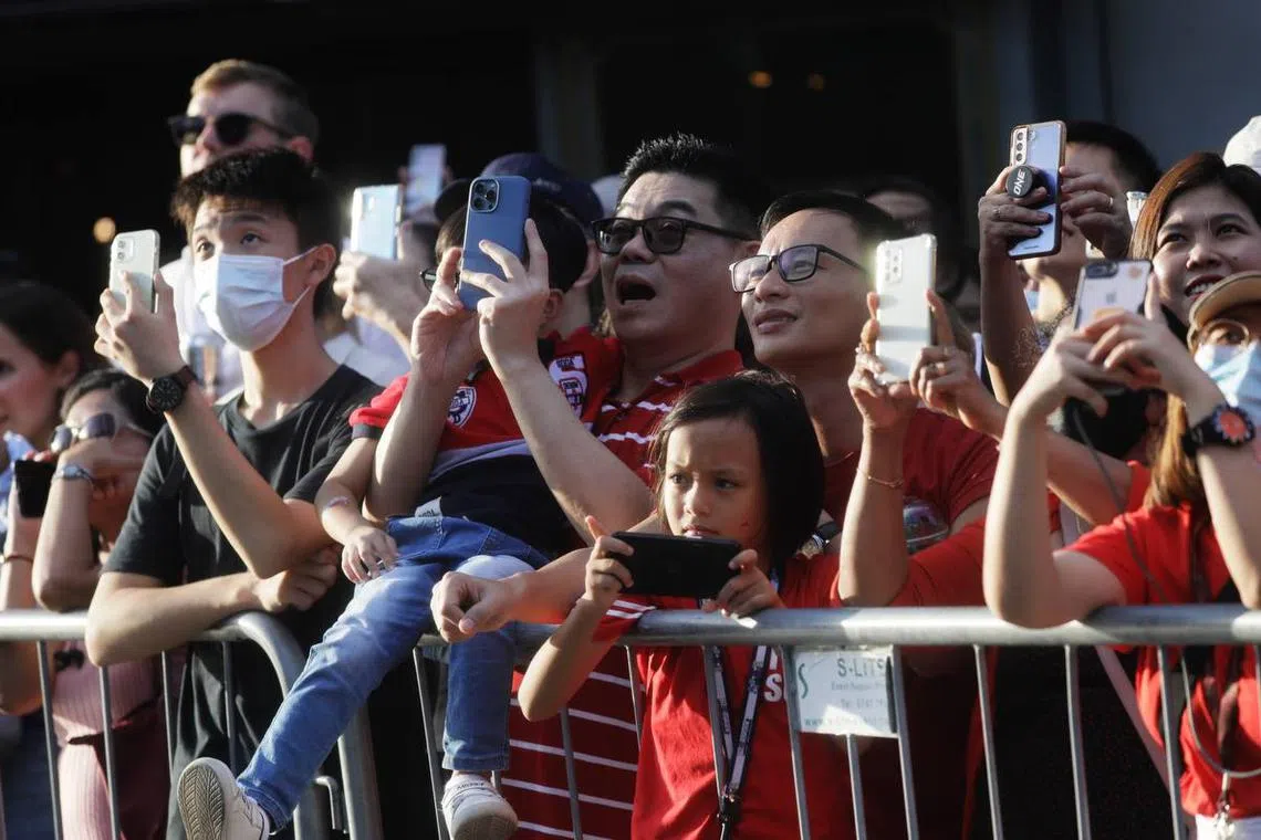 Red Lions wow the crowd outside Raffles City on Aug 9, 2023. ST PHOTO: KELVIN CHNG