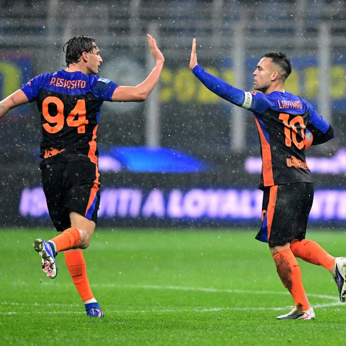 Soccer Football - Serie A - Inter Milan v Pisa SC - San Siro, Milan, Italy - January 23, 2026 Inter Milan's Lautaro Martinez celebrates scoring their second goal with Francesco Pio Esposito REUTERS/Daniele Mascolo