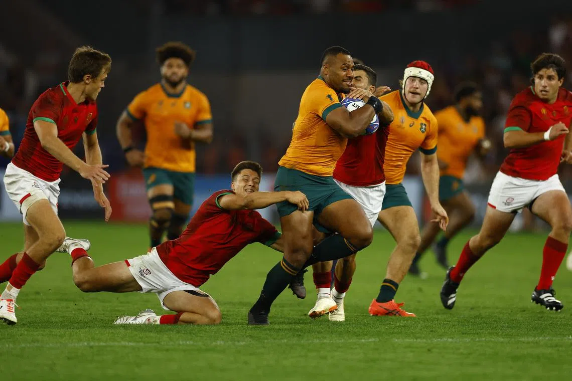 Australia's Samu Kerevi in action with Portugal's Rodrigo Marta.