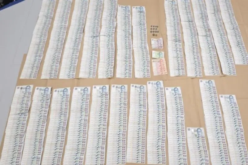 Cash amounting to about $50,000 was recovered and seized as a case exhibit.