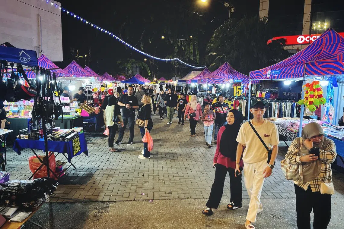 Quieter crowds seen at the popular Pasar Karat night market near Johor Bahru city centre on Oct 4.