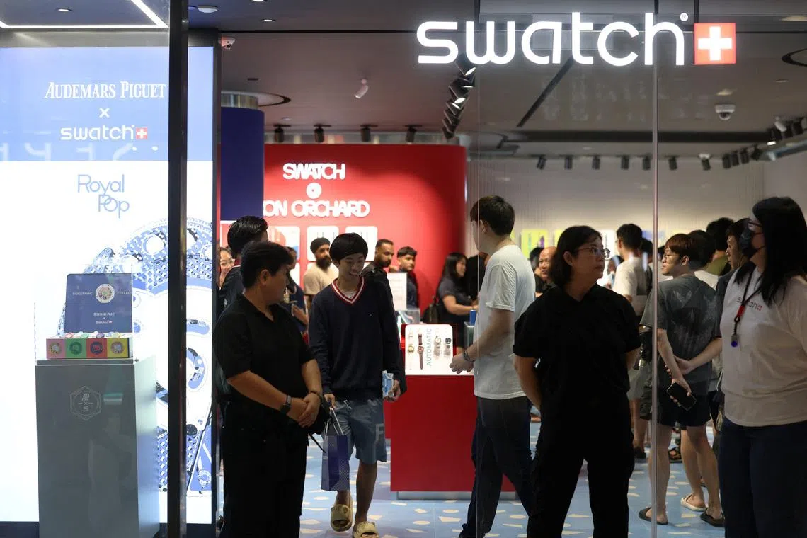 Shoppers at the Audemars Piguet x Swatch “Royal Pop” launch at ION Orchard on May 16. Swatch said its VivoCity store would remain closed on May 16 in view of public safety considerations.