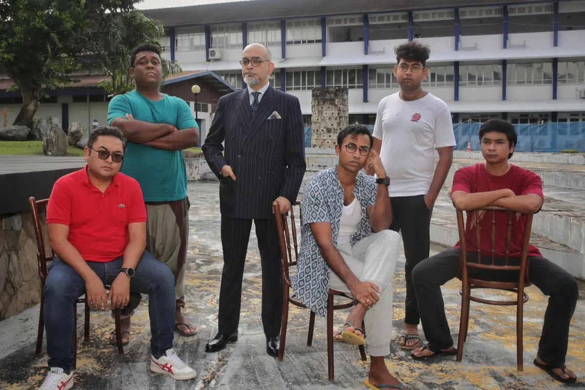 Director Huzir Sulaiman (centre, in suit) and the five actors playing the titular characters in Brown Boys Don't Tell Jokes. 