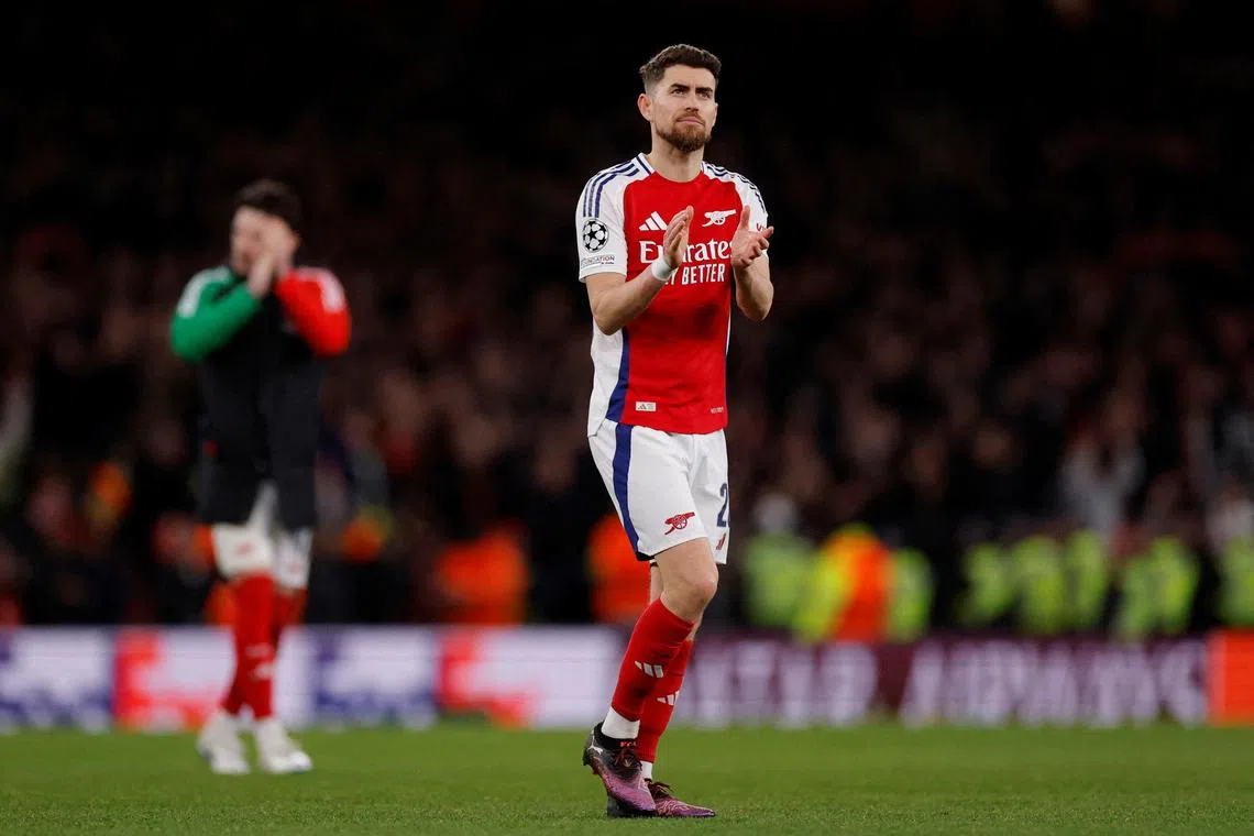 FILE PHOTO: Soccer Football - Champions League - Round of 16 - Second Leg - Arsenal v PSV Eindhoven - Emirates Stadium, London, Britain - March 12, 2025 Arsenal's Jorginho applauds fans after the match Action Images via Reuters/Andrew Couldridge/File Photo