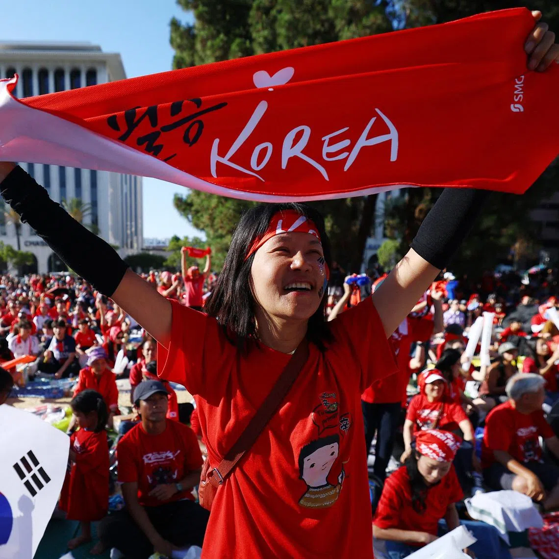 Soccer Football - FIFA World Cup 2026 - Group A - South Africa v South Korea - Fans gather in Los Angeles - Los Angeles, California, U.S. - June 24, 2026 A South Korea fan reacts as they gather to watch the match in Los Angeles REUTERS/Lisi Niesner