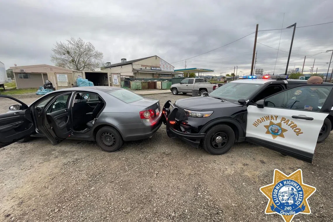 The boy reversed his car and rammed into an officer’s patrol car.