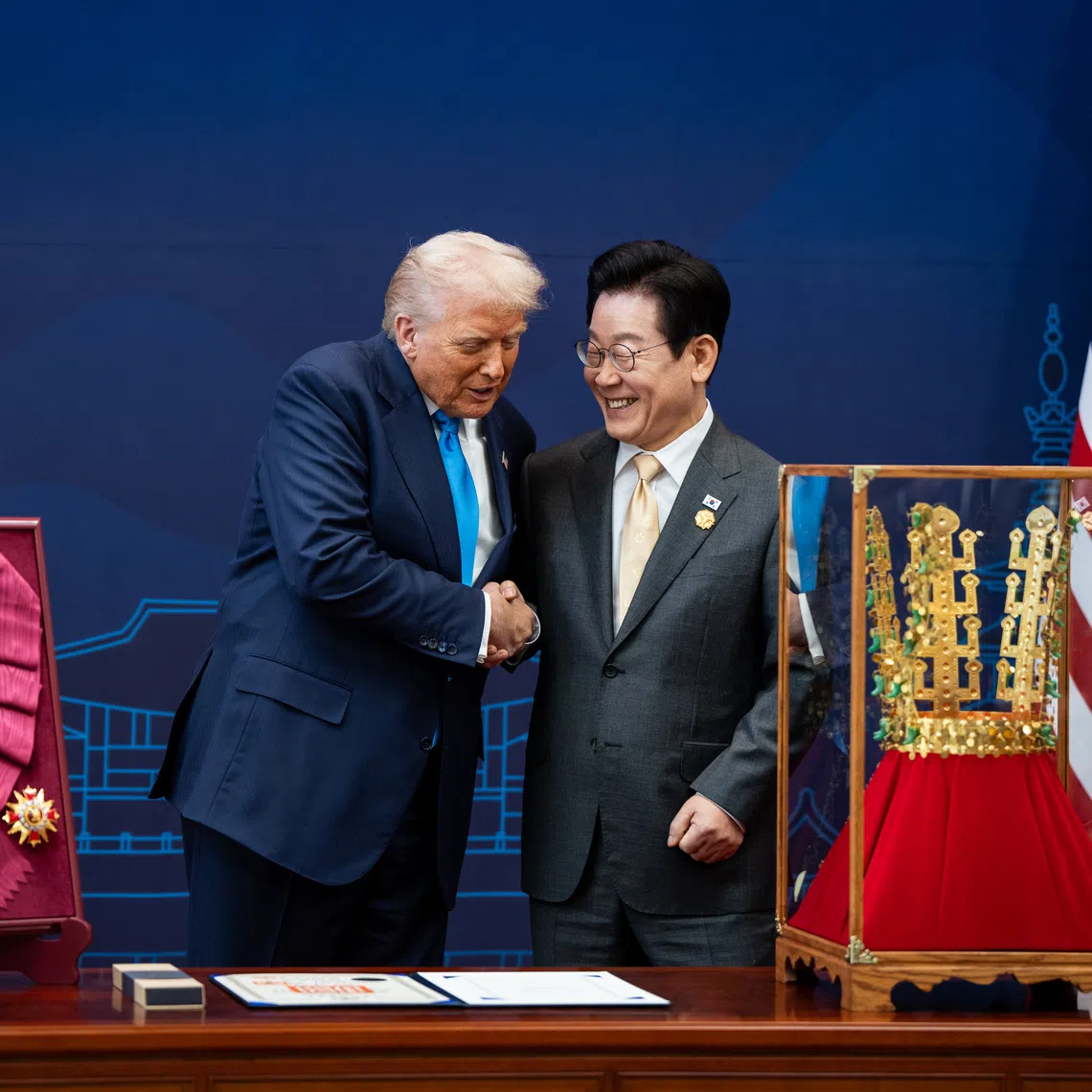 South Korean President Lee Jae Myung (right) presenting US President Donald Trump with the country’s highest honour, the Grand Order of Mugunghwa, and a replica of an ancient Silla kingdom gold crown on Oct 29.