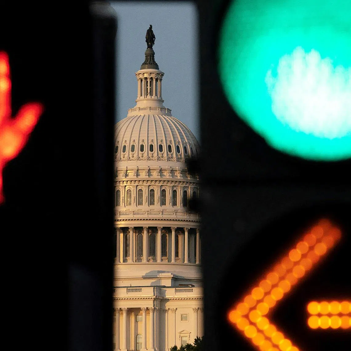 Stoplights change in front of the U.S. Capitol as Republican lawmakers struggle to pass U.S. President Donald Trump's sweeping spending and tax bill, on Capitol Hill in Washington, D.C., U.S., June 30, 2025. REUTERS/Nathan Howard TPX IMAGES OF THE DAY