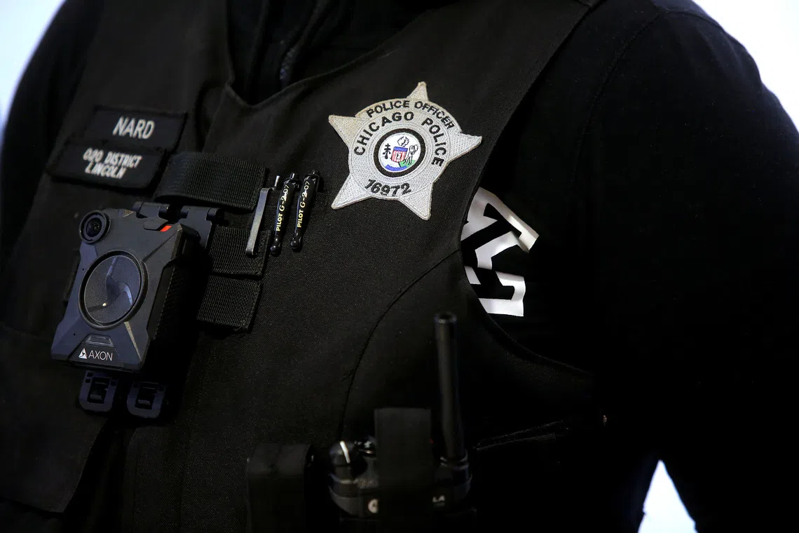 A Chicago Police officer wears body camera during a news conference at the 20th District Chicago Police Department in Chicago, Illinois, U.S. October 30, 2017. REUTERS/Joshua Lott