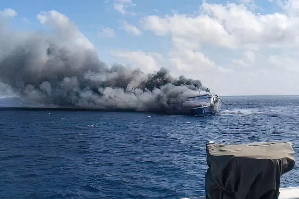 The passenger ship Mutiara Sentosa 2 catching fire in the waters off Madura island, East Java. The Indonesian ferry caught fire while at sea.