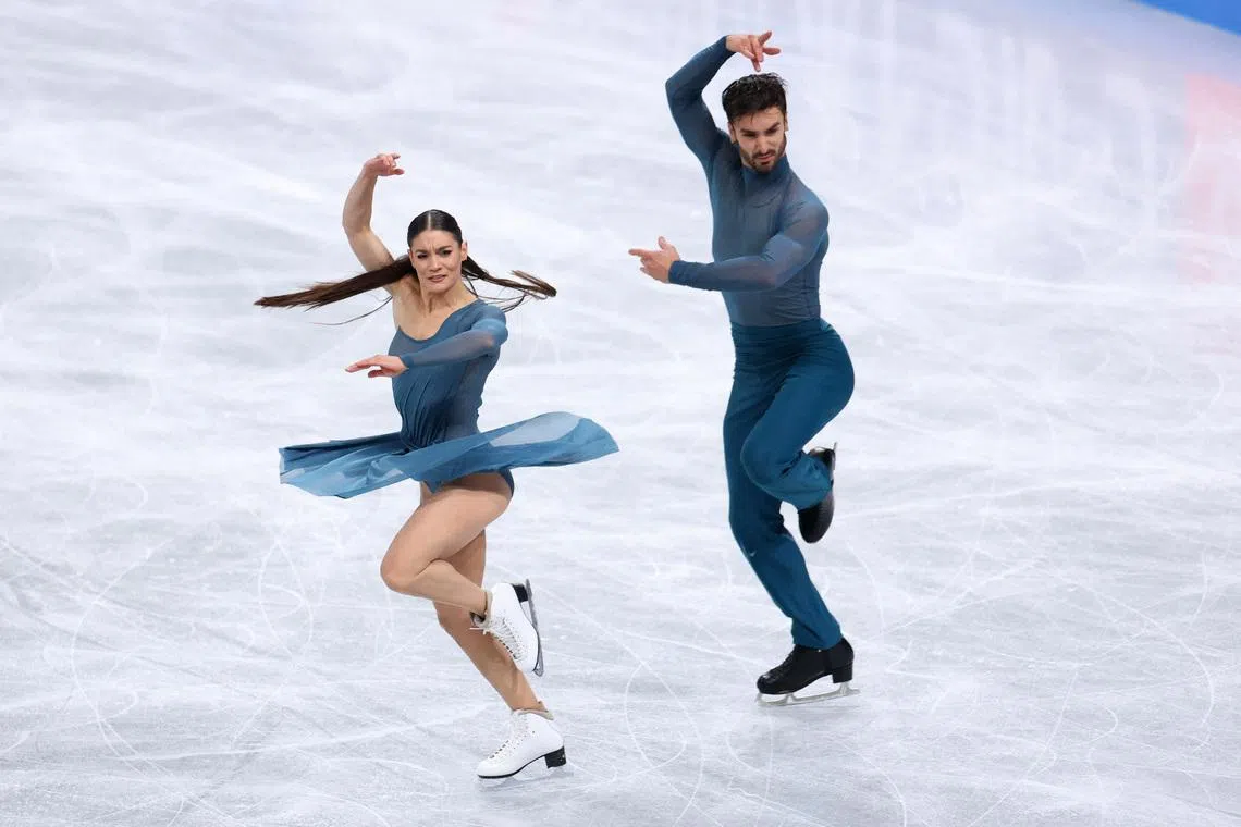Figure Skating - ISU Grand Prix of Figure Skating - Grand Prix Final - Aichi International Arena, Nagoya, Japan - December 6, 2025 France's Laurence Fournier Beaudry and Guillaume Cizeron perform during the Ice Dance Free Dance. REUTERS/Issei Kato