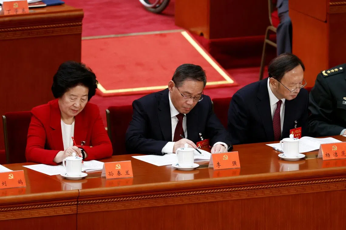 China’s outgoing Vice-Premier Sun Chunlan (left) said that China's fight against the pandemic is at a new stage and it comes with new tasks.