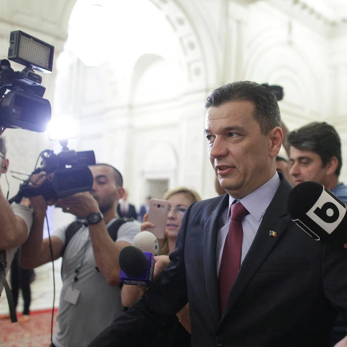 Romanian Prime Minister Sorin Grindeanu walks after a no-confidence motion in Bucharest, Romania, June 21, 2017. Inquam Photos/Octav Ganea via REUTERS
