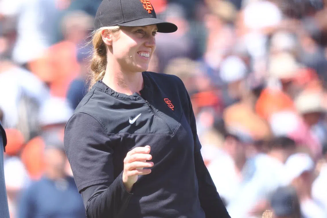 May 25, 2022; San Francisco, California, USA; San Francisco Giants major league coach Alyssa Nakken (92) celebrates after a win against the New York Mets at Oracle Park. Mandatory Credit: Kelley L Cox-USA TODAY Sports/ File Photo