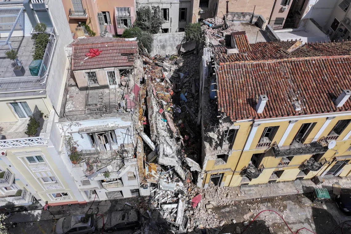 One dead, 5 missing after explosion destroys building in Athens