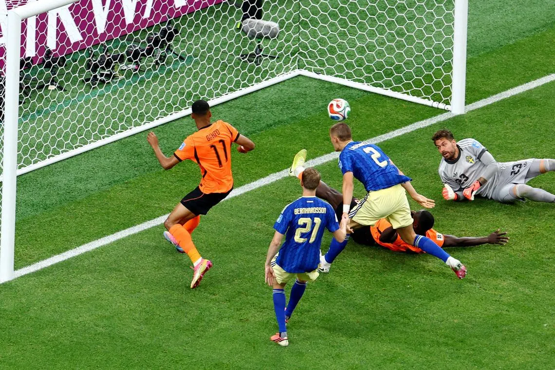 Soccer Football - FIFA World Cup 2026 - Group F - Netherlands v Sweden - Houston Stadium, Houston, Texas, U.S. - June 20, 2026 Netherlands' Cody Gakpo scores their third goal REUTERS/Pedro Nunes