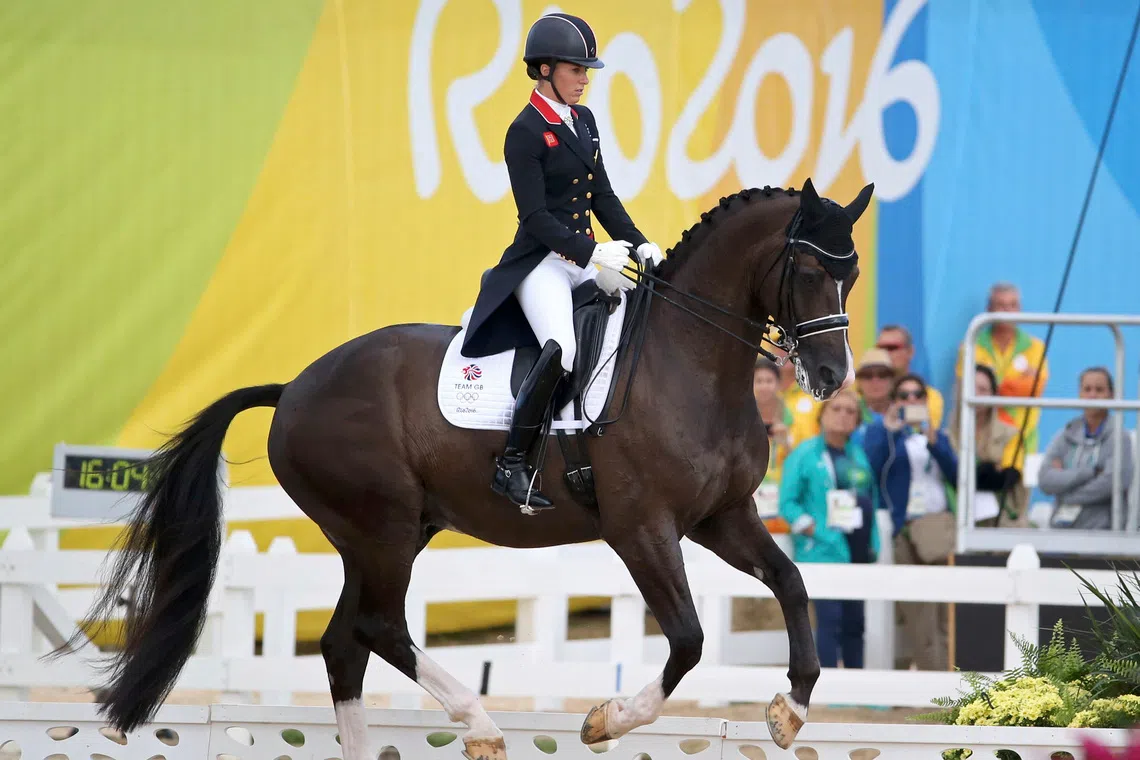 2016 Rio Olympics - Equestrian - Final - Dressage Team Grand Prix Special - Deodoro Olympic Equestrian Centre - Rio de Janeiro, Brazil - 12/08/2016. Charlotte Dujardin (GBR) of Britain riding Valegro performs. REUTERS/Tony Gentile