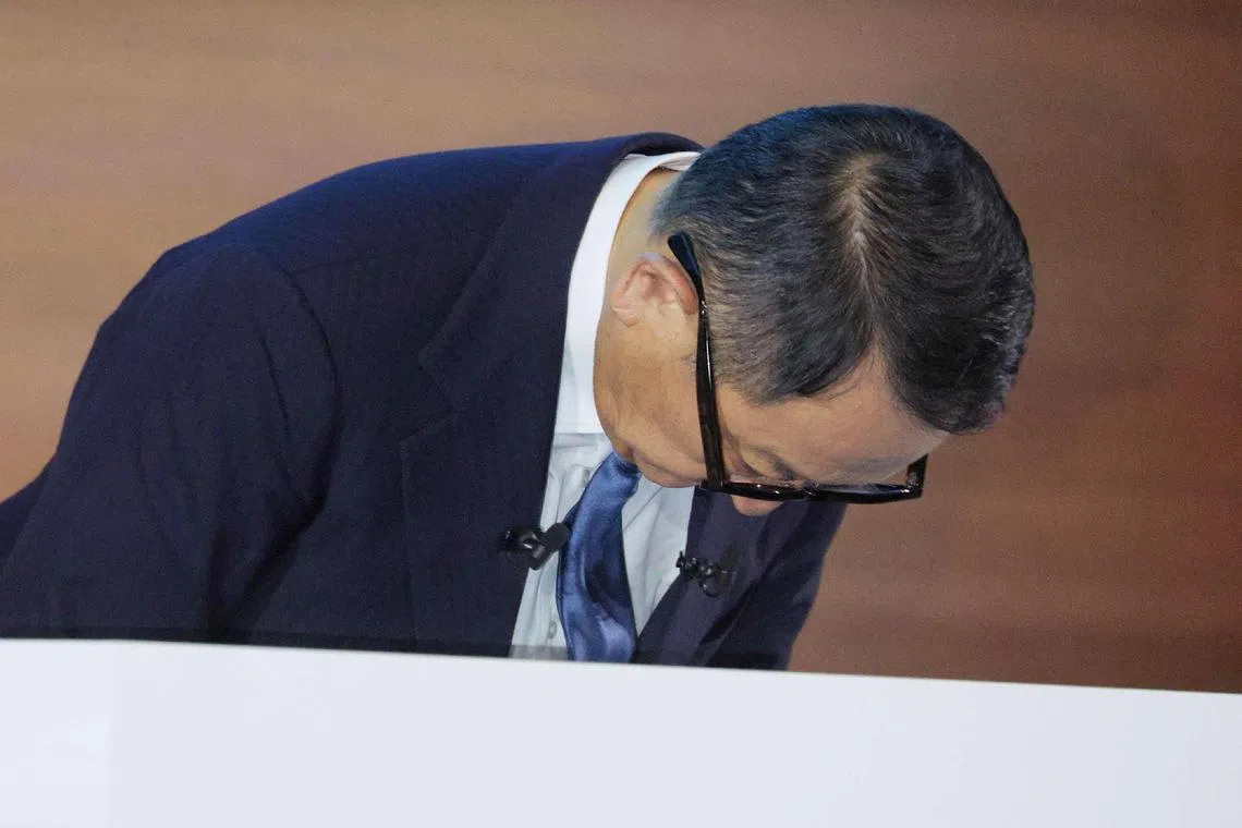 Toyota Motor Corporation Board Chairman Akio Toyoda bows in apology over recent scandals involving subsidiaries of the Japanese auto giant on Jan 30, 2024.