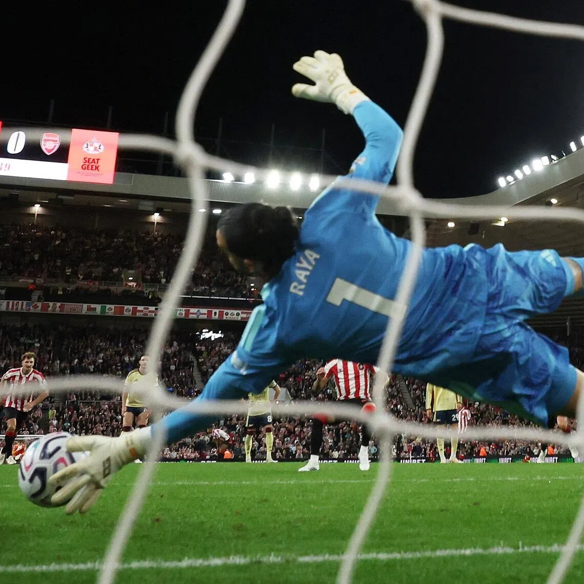 Arsenal’s David Raya saving a penalty by Sunderland’s Enzo le Fee in an EPL game on Sept 12. Arsenal won 2-0.