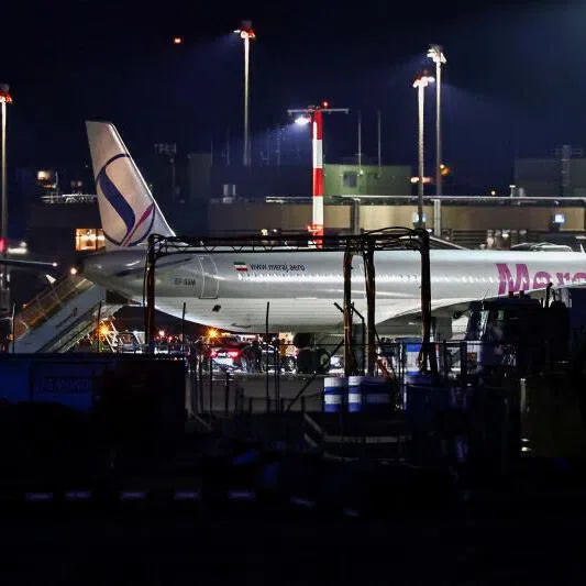A convoy next to a plane after it landed on June 20, carrying an Iranian delegation led by chief negotiator Mohammad Bagher Ghalibaf and Foreign Minister Abbas Araghchi, at the Zurich International Airport, Switzerland.