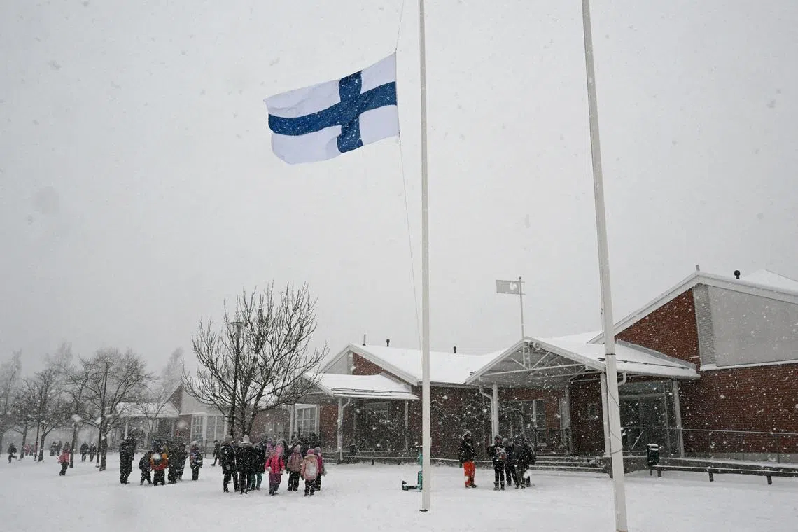 FILE PHOTO: The flag of Finland flies at half-mast at the Viertola school, following a shooting incident at the school, in Vantaa, Finland, on Wednesday, April 3, 2024.  Lehtikuva/Jussi Nukari via REUTERS/File Photo