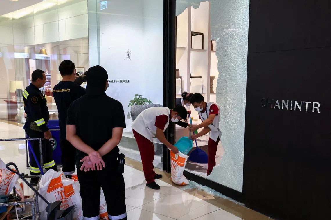 Shops in Siam Paragon reopen, but shoppers stay away a day after shooting ...
