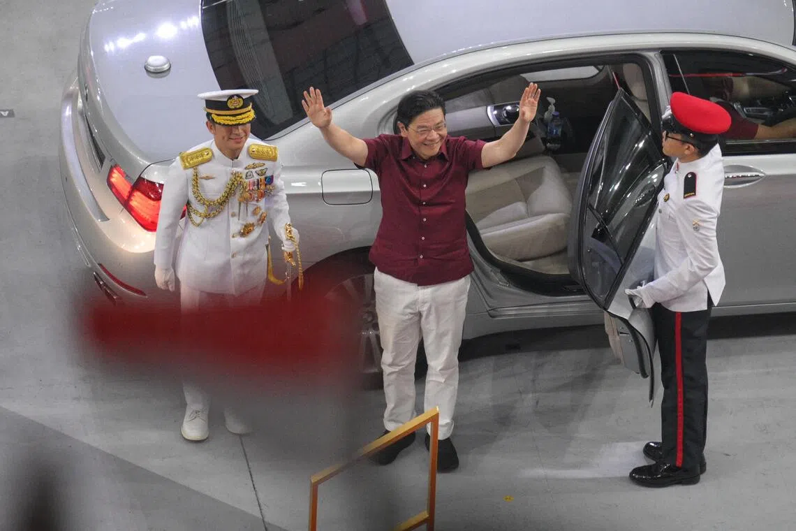 PM Lawrence Wong was greeted by rousing cheers as he entered the National Stadium.