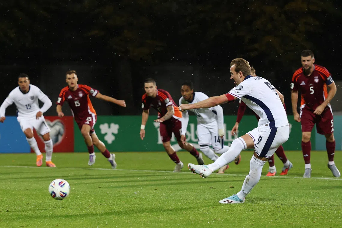 Soccer Football - FIFA World Cup - UEFA Qualifiers - Group K - Latvia v England - Daugava Stadium, Riga, Latvia - October 14, 2025 England's Harry Kane scores their third goal from the penalty spot Action Images via Reuters/Paul Childs