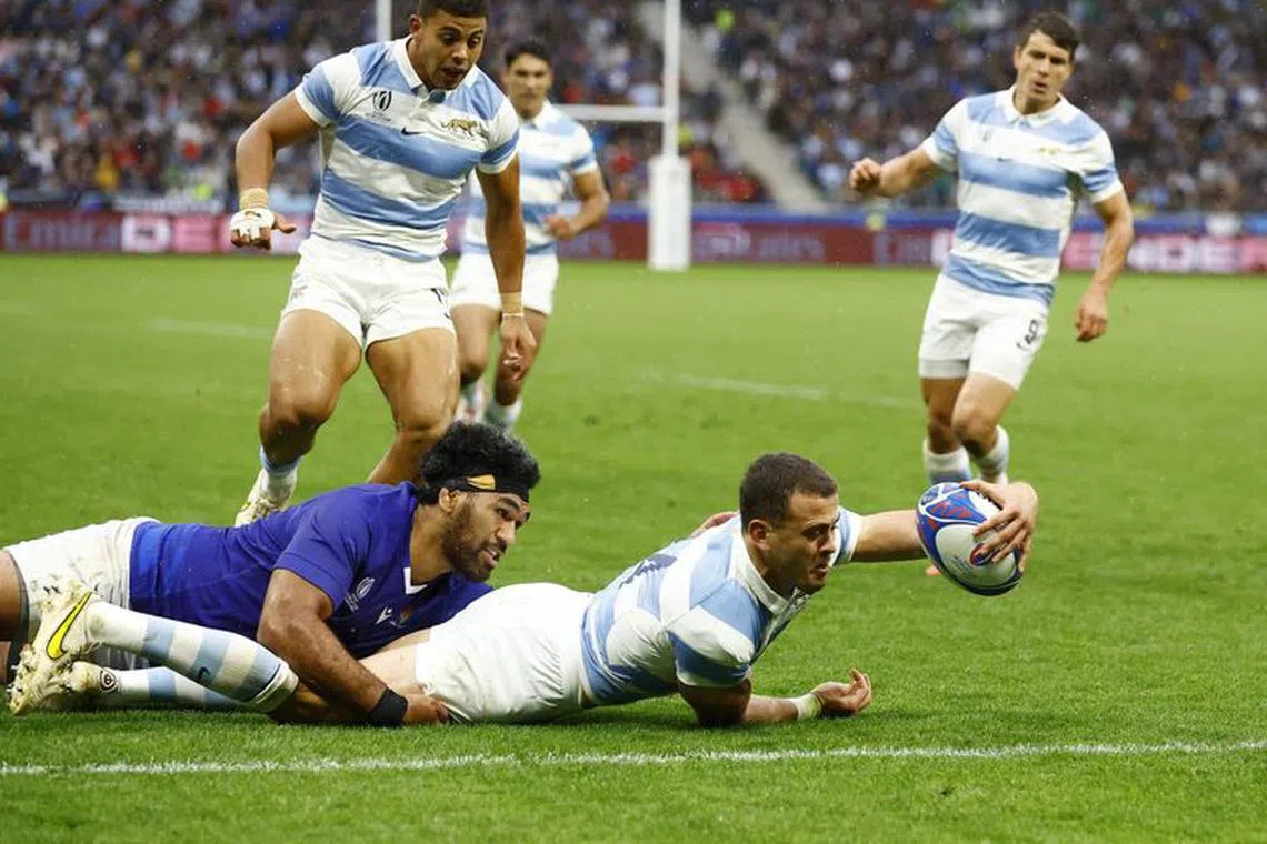 Rugby Union - Rugby World Cup 2023 - Pool D - Argentina v Samoa - Stade Geoffroy-Guichard, Saint-Etienne, France - September 22, 2023 Argentina's Emiliano Boffelli scores their first try REUTERS/Peter Cziborra