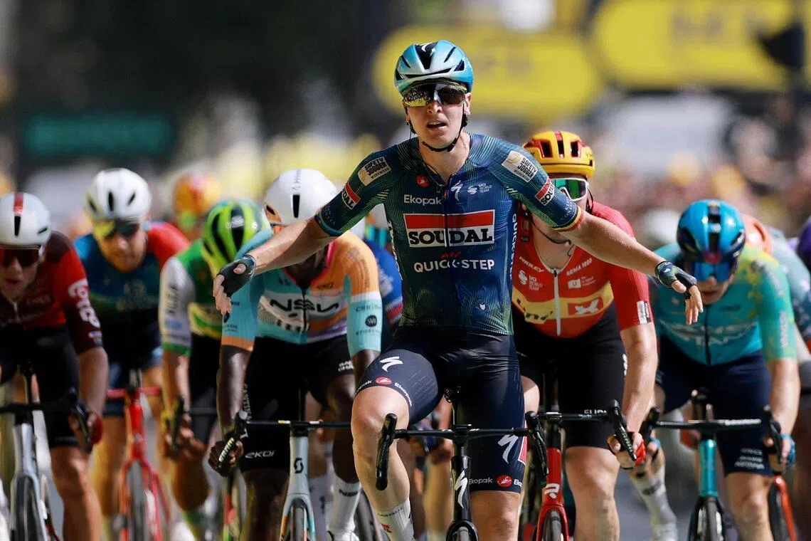 Belgium’s Tim Merlier sprints to stage seven victory, as Pogacar retains Tour de France lead