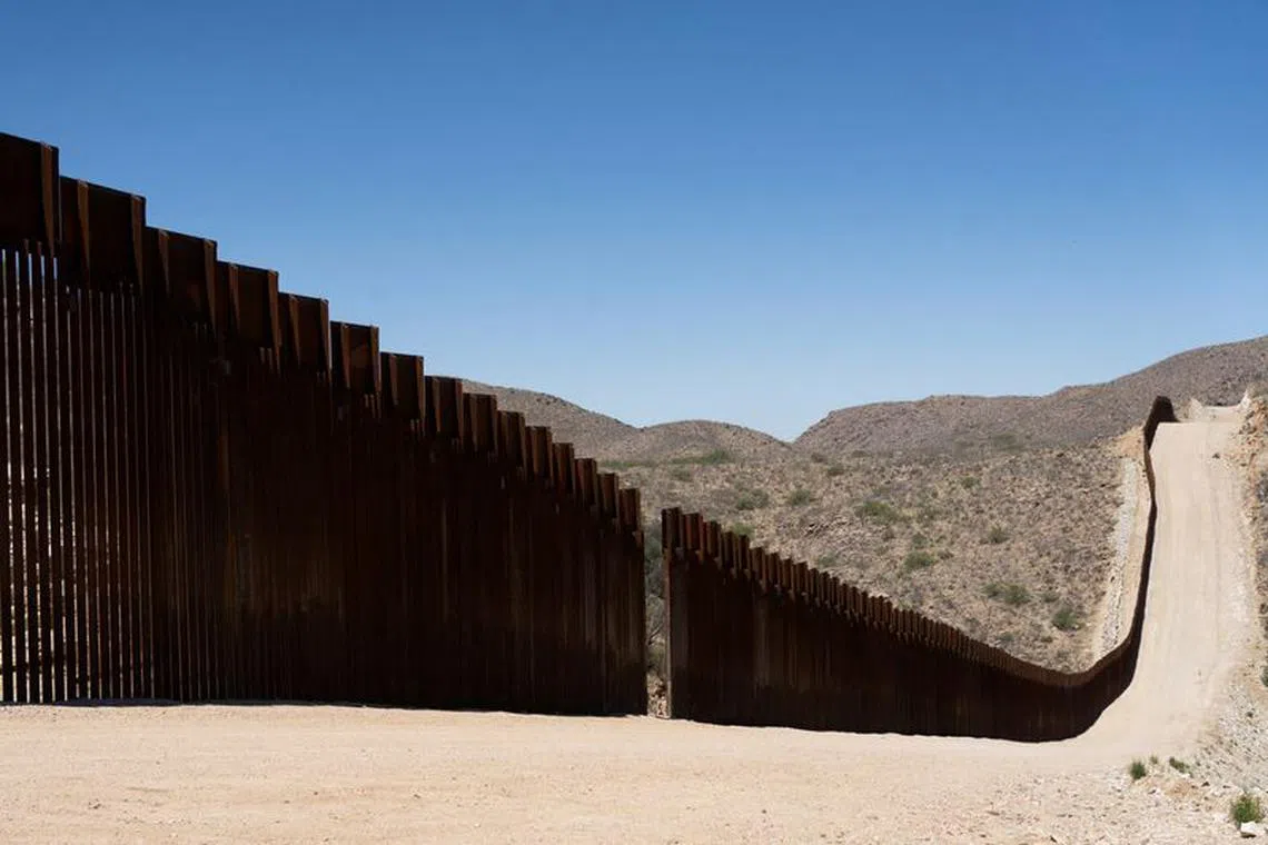 FILE PHOTO: A gap in the U.S.-Mexico border fence near Sasabe, Arizona, U.S., May 10, 2022. REUTERS/Rebecca Noble/File Photo