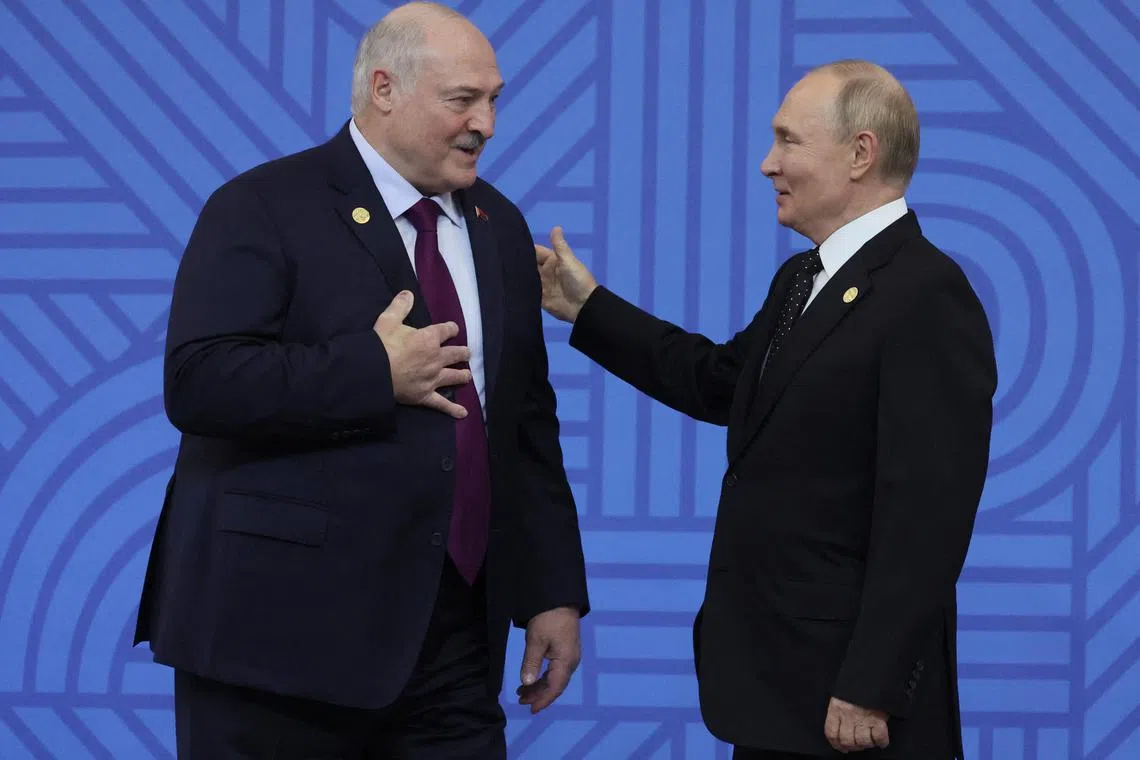 Russia's President Vladimir Putin and Belarusian President Alexander Lukashenko take part in an official welcoming ceremony for delegations' heads at the BRICS summit in Kazan, Russia, 23 October 2024. Maxim Shipenkov/Pool via REUTERS