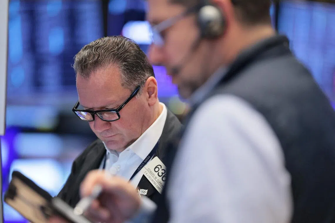 Traders at work on the floor of the New York Stock Exchange, in New York City.