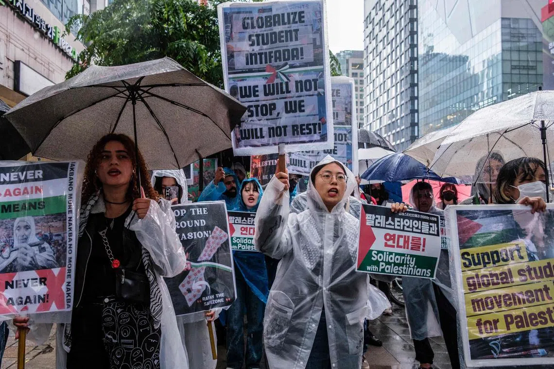 Activists attend a pro-Palestinian rally in Seoul on May 15.