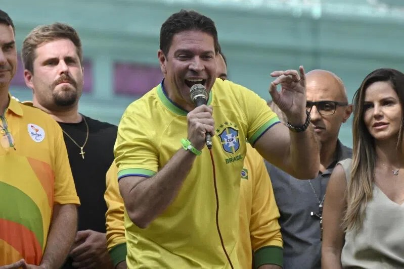 Brazil's former spy chief Alexandre Ramagem (centre) was sentenced to over 16 years in prison for plotting a coup with ex-president Jair Bolsonaro.