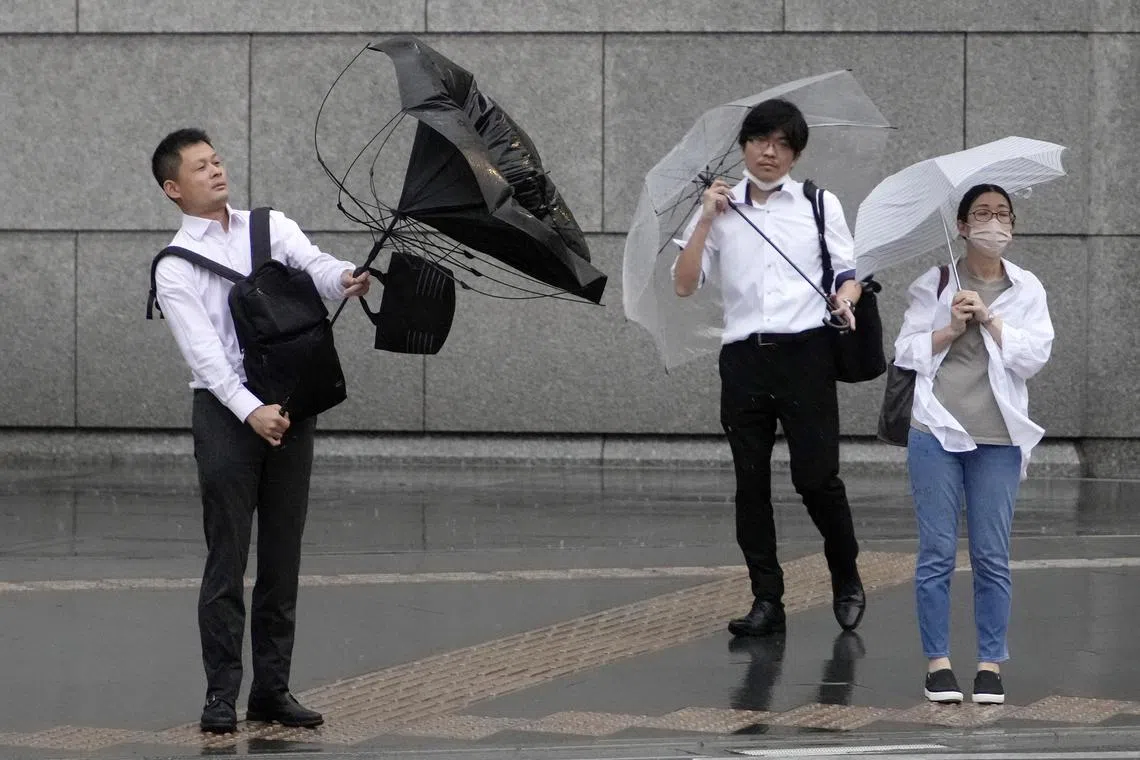 In central and western Japan, many evacuation orders were downgraded on Saturday as rains eased. 