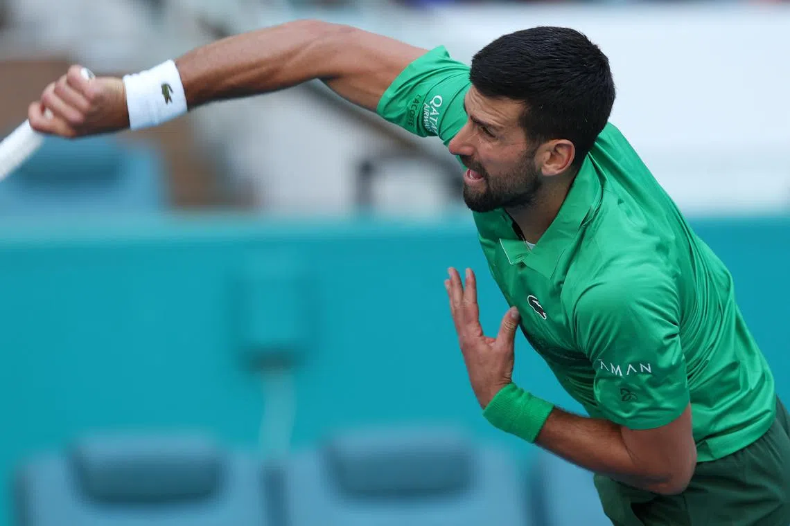 FILE PHOTO: Mar 21, 2025; Miami, FL, USA; Novak Djokovic (SRB) serves against Rinky Hijikata (AUS)(not pictured) on day four of the Miami Open at Hard Rock Stadium. Geoff Burke-Imagn Images/File Photo