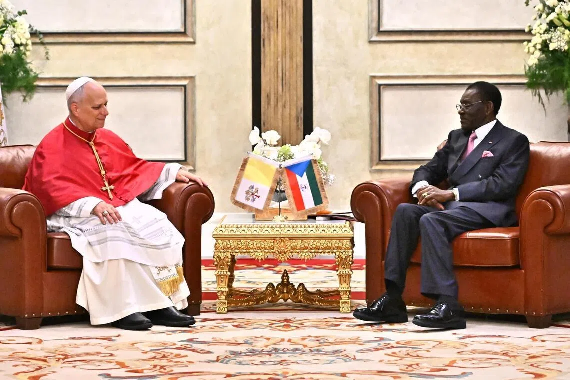 Pope Leo XIV (L) meets with President of Equatorial Guinea Teodoro Obiang Nguema Mbasogo (R) at the Presidential Palace in Malabo, Equatorial Guinea, on April 21.