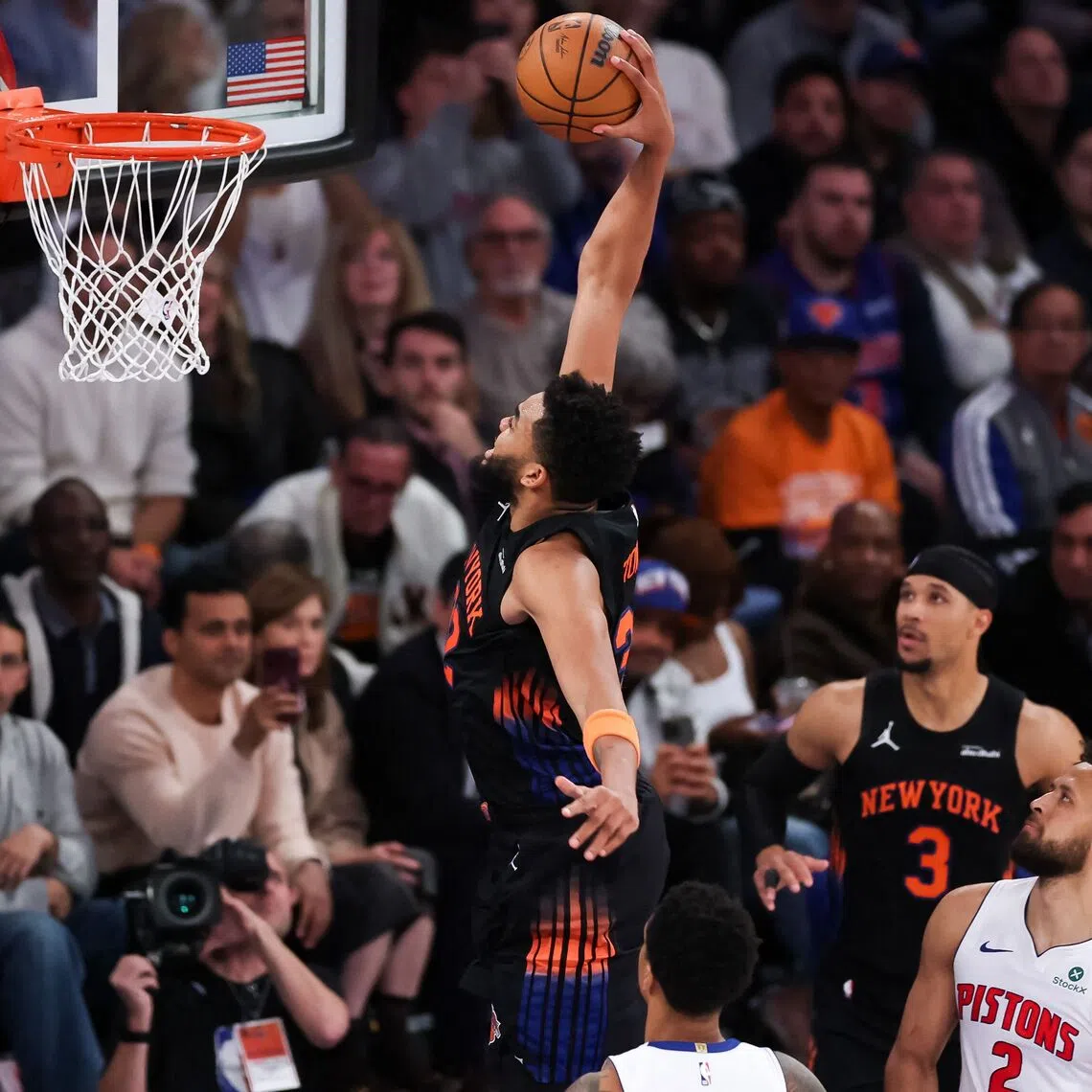 Top-scorer Karl-Anthony Towns of the New York Knicks dunks the ball during the third quarter against the Detroit Pistons at Madison Square Garden on Oct 27.