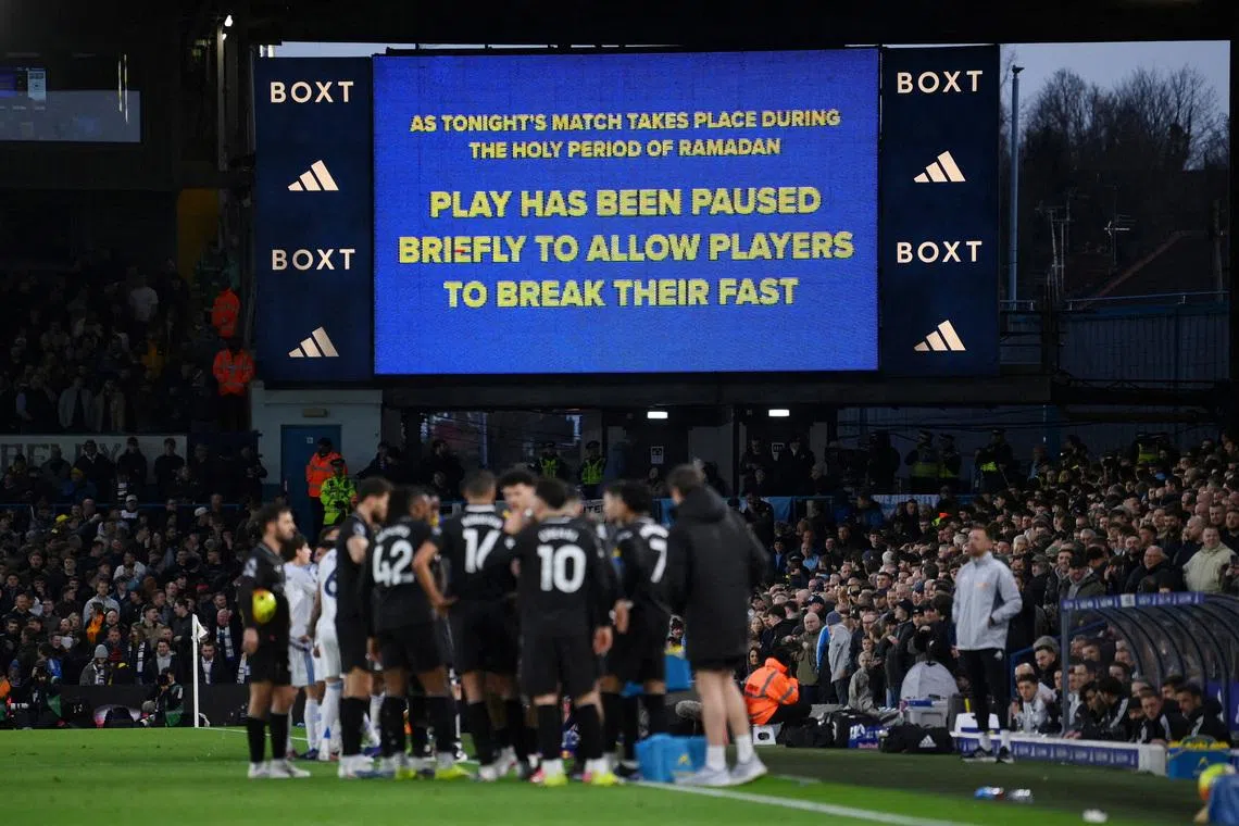Soccer Football - Premier League - Leeds United v Manchester City - Elland Road, Leeds, Britain - February 28, 2026 A big screen displays a message as play stops to allow players to break their fast for Ramadan REUTERS/Jaimi Joy