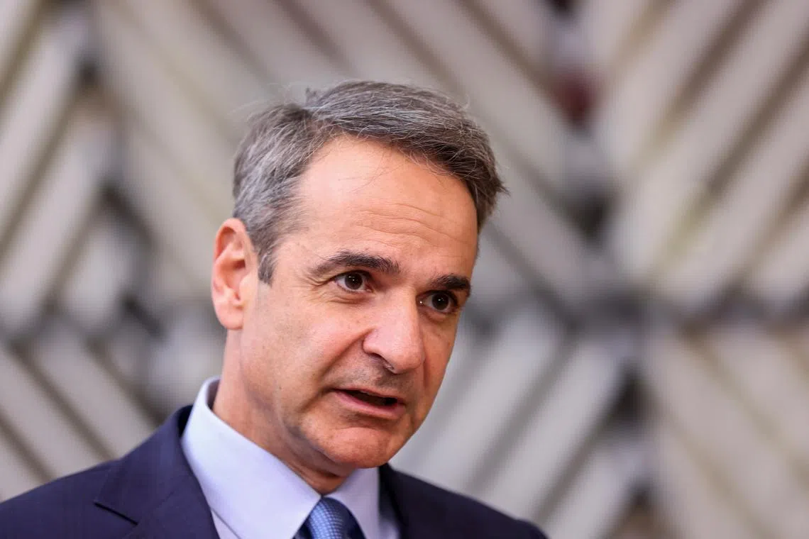 FILE PHOTO: Greek Prime Minister Kyriakos Mitsotakis speaks to the press as he attends a European Union leaders summit in Brussels, Belgium March 21, 2024. REUTERS/Johanna Geron/File Photo