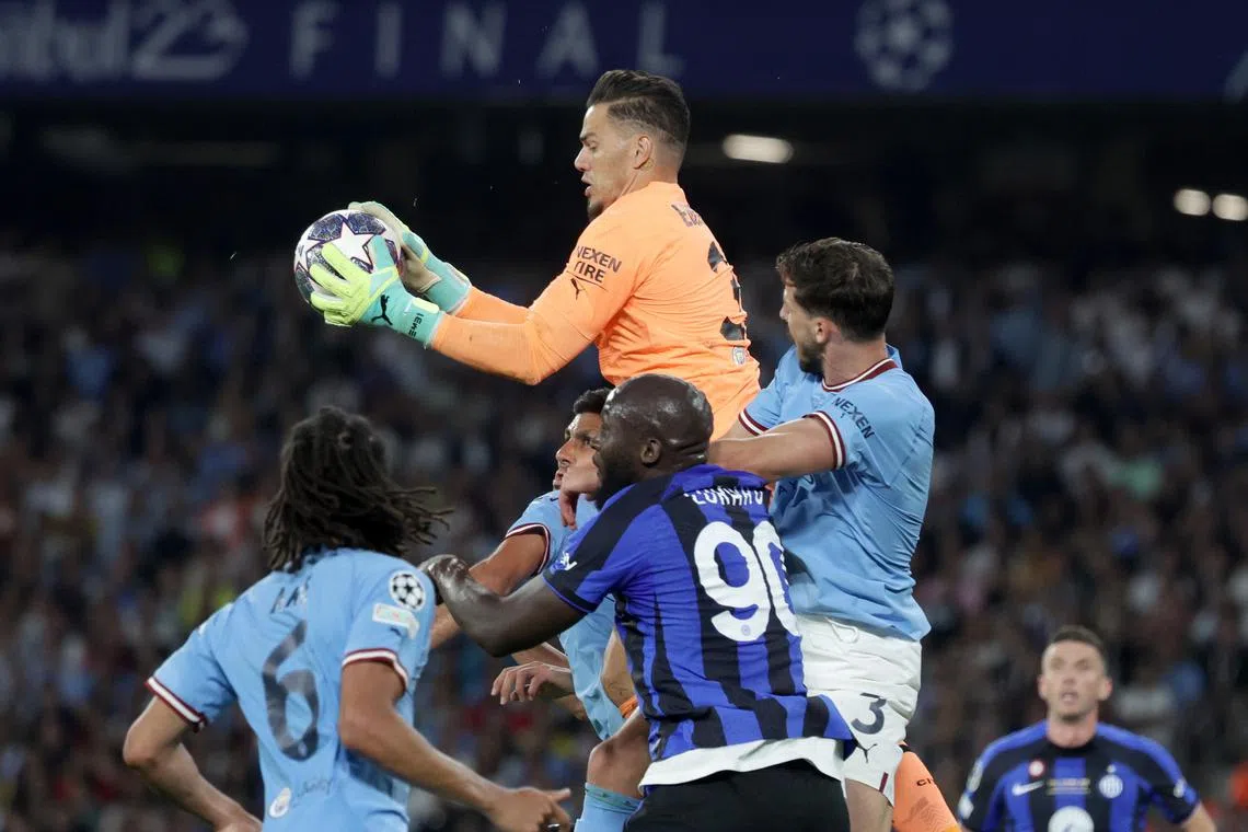 Manchester City goalkeeper Ederson in action during the match.