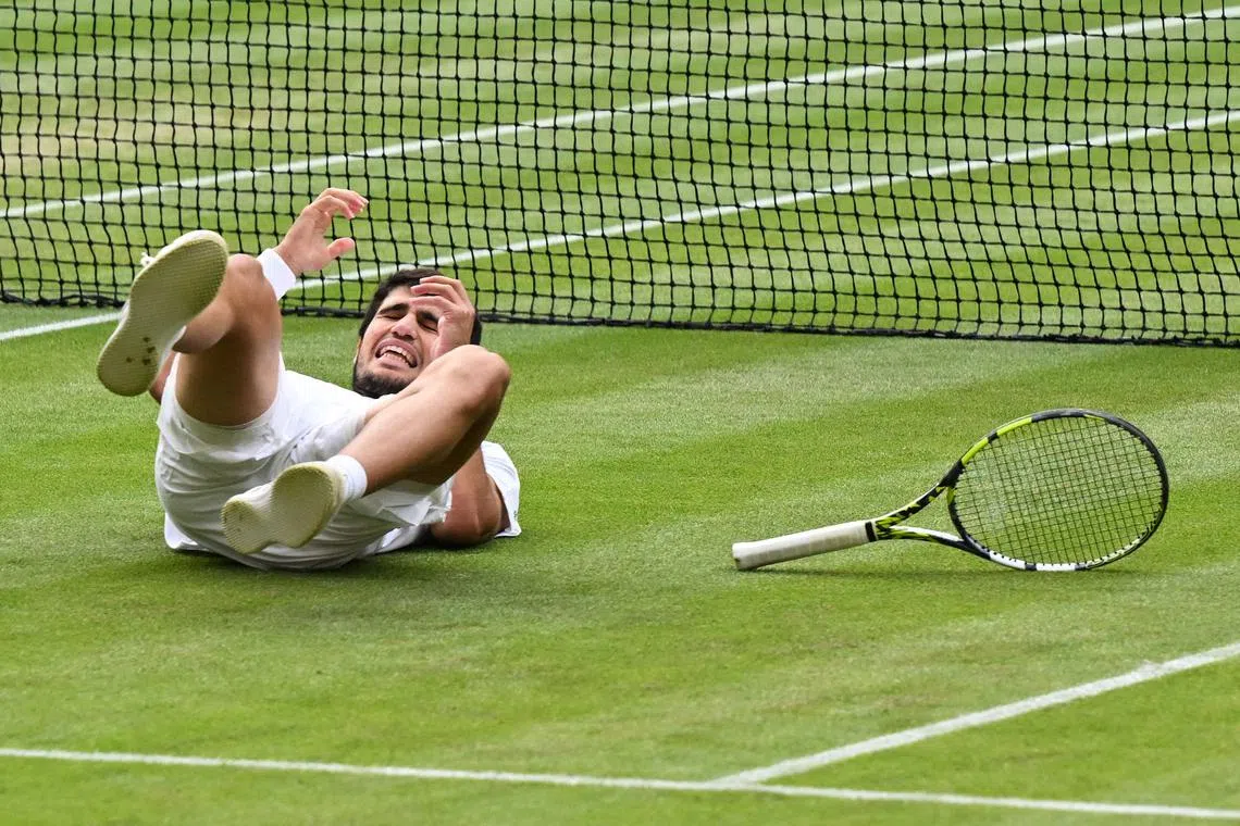 Spain's Carlos Alcaraz celebrates beating Serbia's Novak Djokovic during their men's singles final tennis match on the last day of the 2023 Wimbledon Championships at The All England Tennis Club in Wimbledon, London, on July 16.