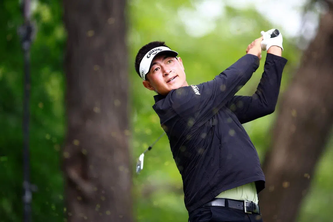 Carl Yuan of China hits his first shot on the 18th hole during the second round of the RBC Canadian Open at Oakdale Golf & Country Club.