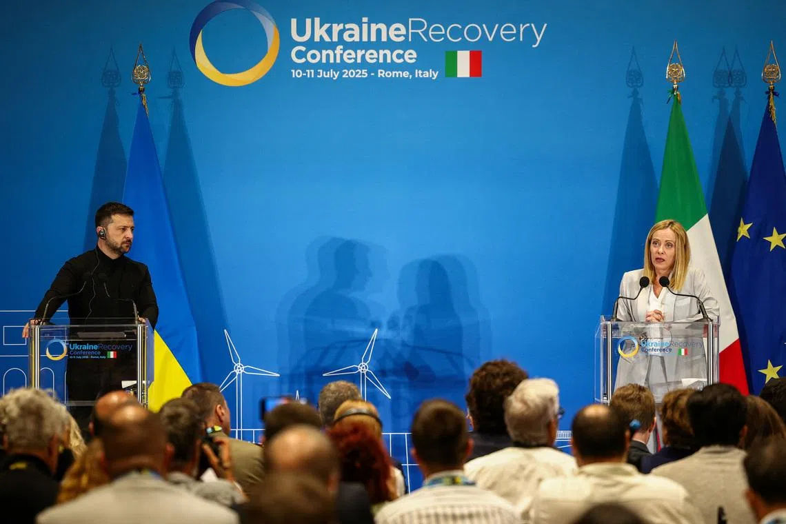 Italian Prime Minister Giorgia Meloni and Ukrainian President Volodymyr Zelenskiy attend a press conference on the first day of the two-day Ukraine Recovery Conference (URC2025), on plans for the reconstruction of Ukraine, in Rome, Italy, July 10, 2025. REUTERS/Guglielmo Mangiapane/File Photo